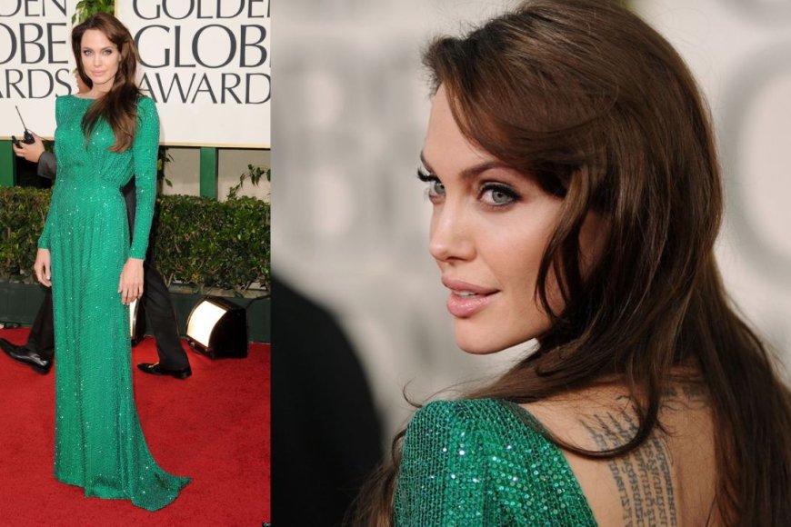 The emerald green Atelier Versace dress that she wore to the 2011 Golden Globe Awards: